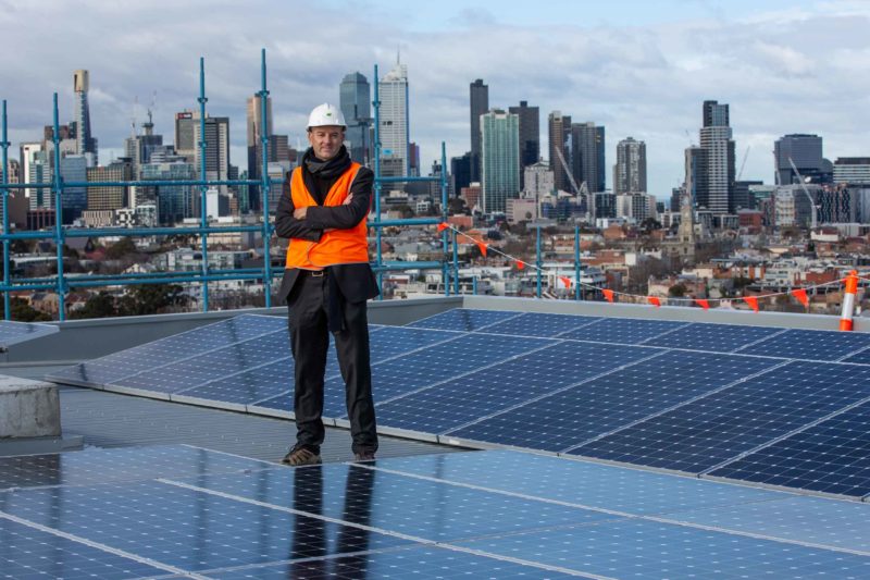 Joshua Wheeler from MGS Architects on the roof of Ozanam House